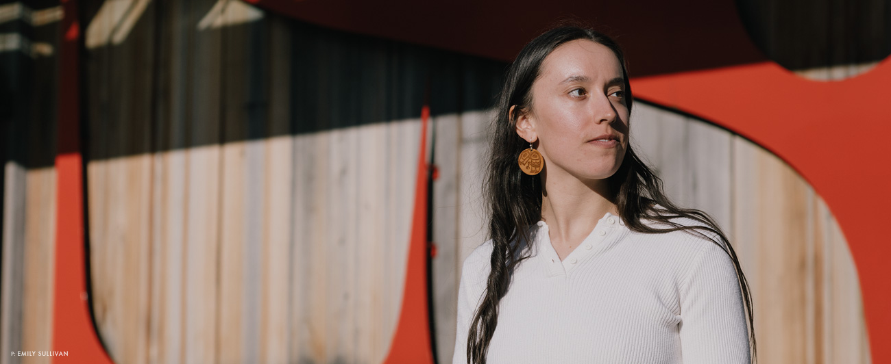 Ellen Bradley stands in front of the Sealaska Heritage Institute’s Walter Sobeloff building in downtown Juneau, AK. Named for her great uncle, the building hosts a Native cultural center and features Lingít formline art on its façade. Photo: Emily Sullivan