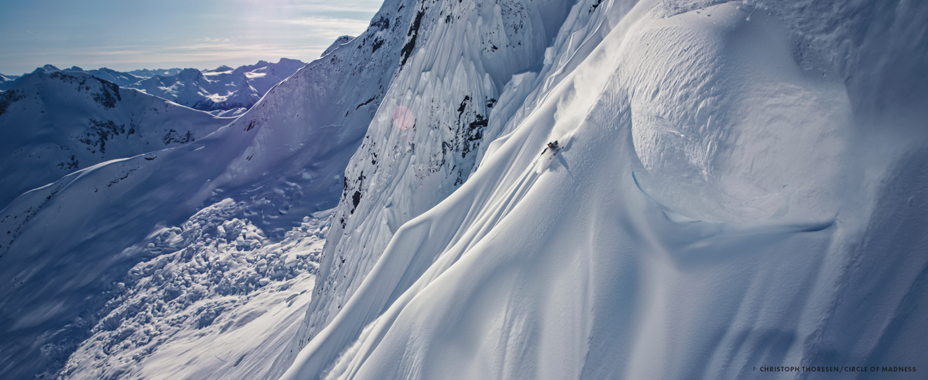 “Markus Eder in Sagrada Familia, a zone in Haines, AK, that Victor de Le Rue and Markus explored while filming for Circle of Madness [2024]. Massive cornices hung all over the place, and the zone was so hostile that at first we considered it inaccessible. When we found a way to establish a four-tent camp in the middle of the face, on a shoulder protected from avalanches, the boys started to dream big. Sagrada Familia is long and sustained for thousands of feet, its name inspired by the famous Barcelona cathedral—the pillow stacks are like the flutes of a giant pipe organ. And you better pray before dropping in.” Photo: Christoph Thoresen/Circle of Madness