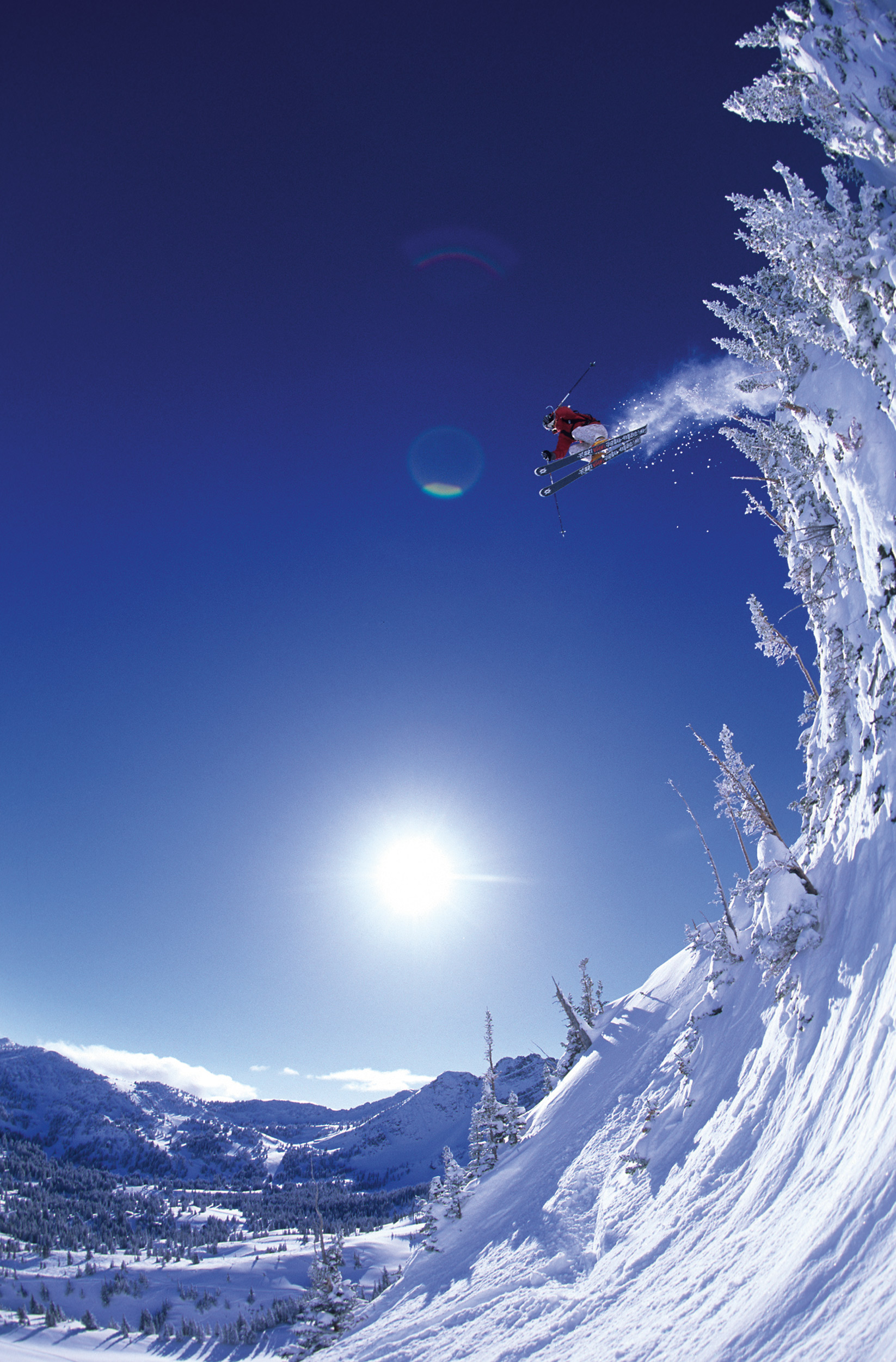 “Spring 2004—we were filming for Warren Miller’s Impact with Jenn Berg, photographer Scott Markewitz and filmer Chris Patterson at Alta, UT, racing other people for rope drops. It was one of the very first film shoots I was on. It was also one of the first times I had stepped up to a bigger air, and being with Jenn was one of the reasons I felt confident. Scott went around and probed the landing for us, which was incredibly thoughtful—not something I always would have thought of at that time in my career. I was at the top with Jenn and we weren’t sure about it but she encouraged me—that good positive peer pressure of ‘If you hit it, I will!’ So, I sent it. It was a flat-ish landing but very deep powder and I was psyched to hit a big air like that, a classic Alta shot—and ski out of it. The 4 feet of fresh snow helped, too.” —Ingrid Backstrom Photo: Scott Markewitz