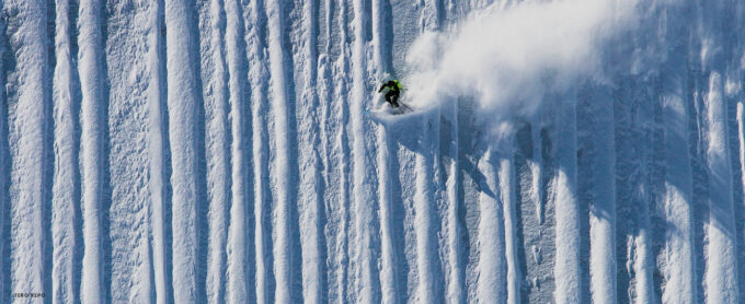 Dust on crust, but make it a 50-degree slope. When climbing and skiing harrowingly steep lines, Sam Anthamatten hauls up what he calls “skis for going fast”—crucial for descents like this in Zinalrothorn, Switzerland, near his home in Zermatt. Photo: Tero Repo